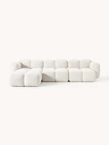 Modulaire bank Tayla (4-zits) van bouclé met poef (links/rechts)