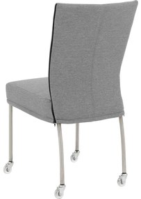 Goossens Eetkamerstoel Funk RVS Poten grijs stof leuning en met wielenTransparant skater wiel met rvs kap, modern design