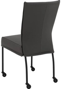 Goossens Eetkamerstoel Funk Zwarte Poten donkergrijs leer leuning en met wielenZwart skater wiel met zwarte kap, modern design