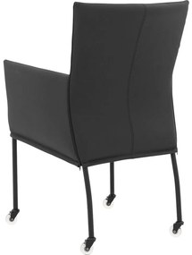 Goossens Eetkamerstoel Funk Zwarte Poten zwart leer met armleuning en met wielen, modern design