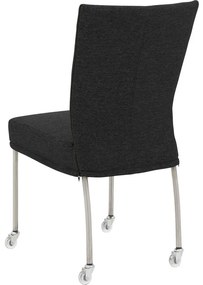 Goossens Eetkamerstoel Funk RVS Poten antraciet stof leuning en met wielenTransparant skater wiel met rvs kap, modern design