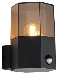 Buiten wandlamp zwart met smoke glas zeshoek en bewegingssensor - Denmark